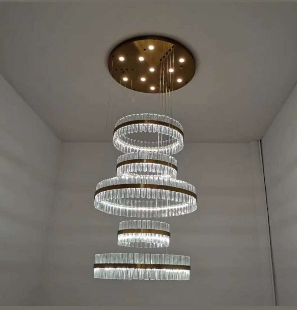 Elegant double-height chandelier lighting