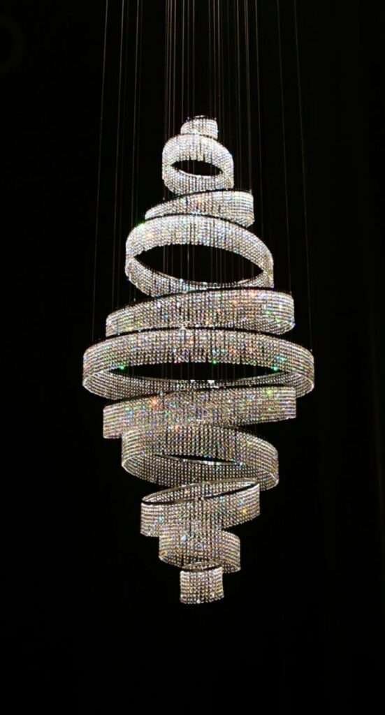 Elegant double-height chandelier lighting