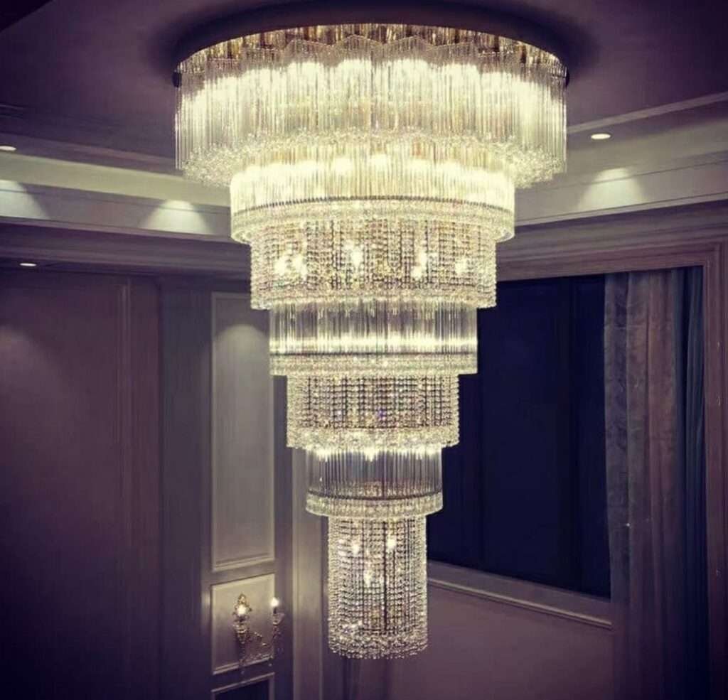 Elegant double-height chandelier lighting