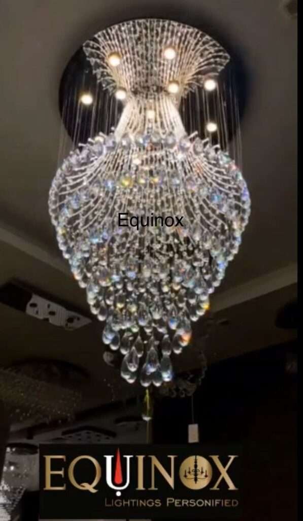 Elegant double-height chandelier lighting