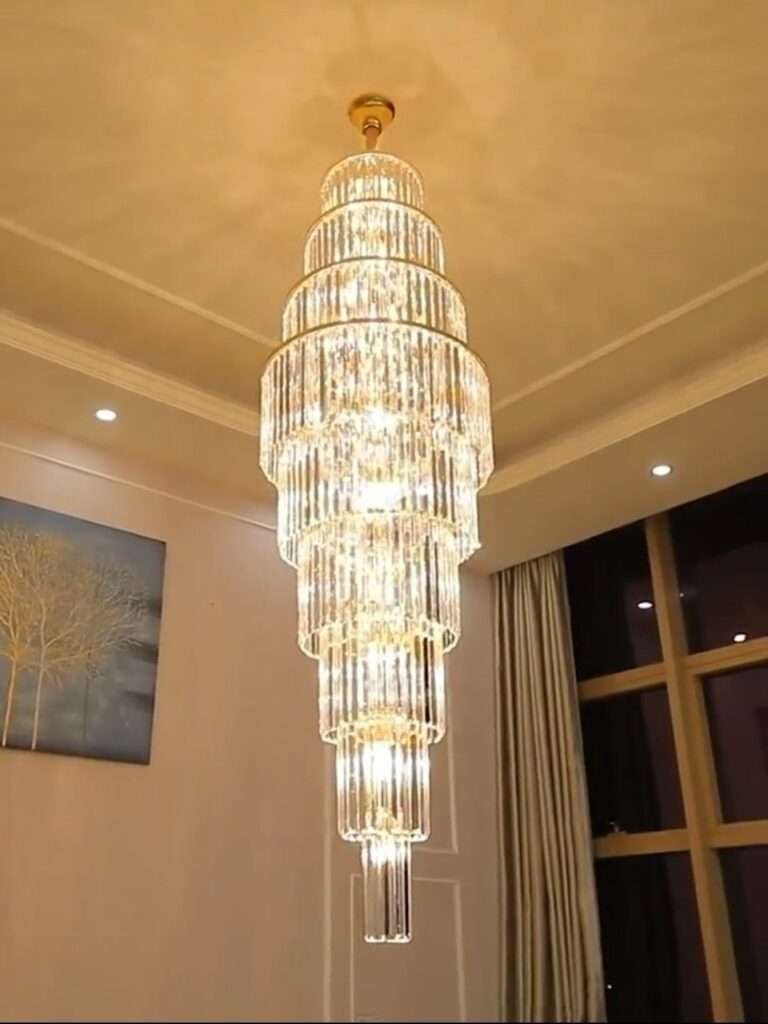 Elegant double-height chandelier lighting