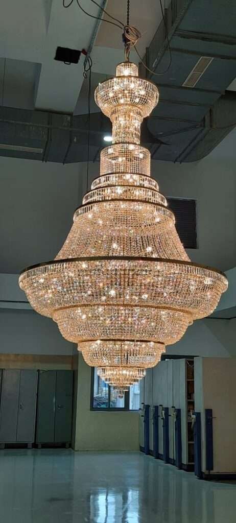 Elegant double-height chandelier lighting