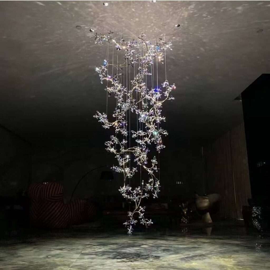 Elegant double-height chandelier lighting